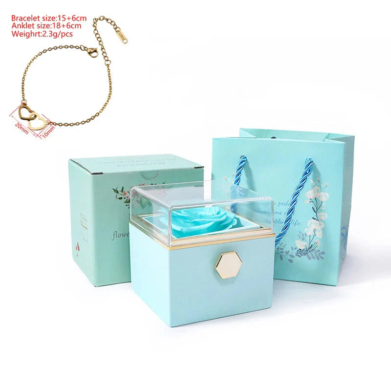 SHOWLU FASHION double heart steel bracelet with eternal rose box, featuring silver-tone links and decorative heart charms.