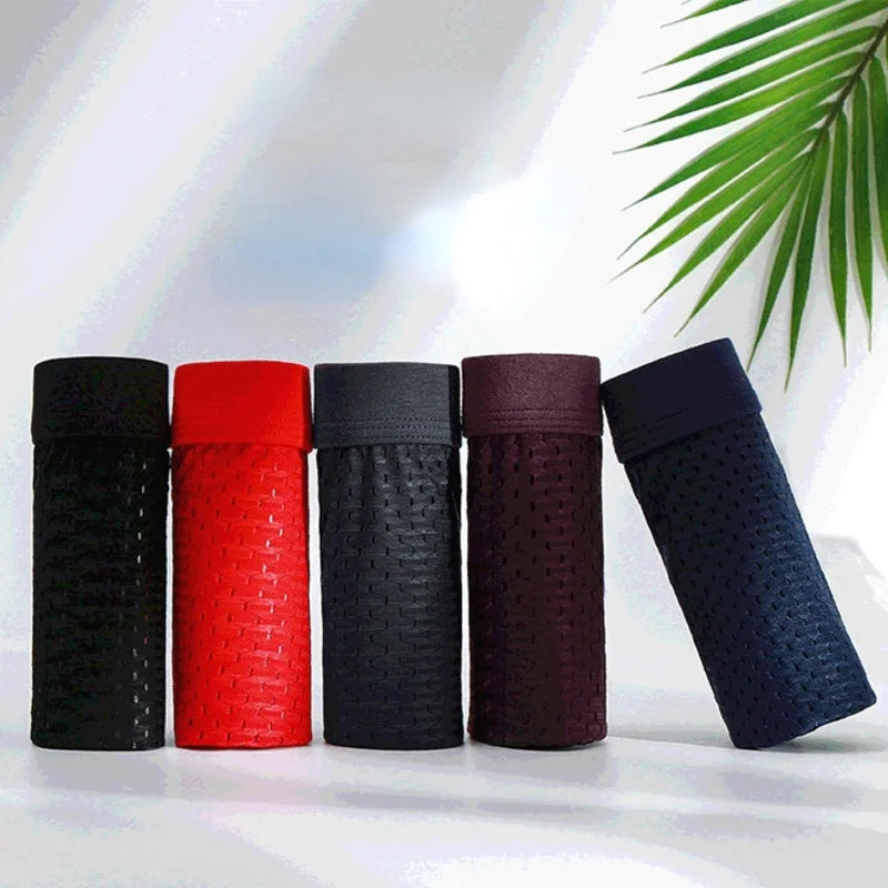 Showlu Men's Ice Silk Boxer Briefs in a 4-pack, breathable mesh underwear with a comfortable fit and sleek design.