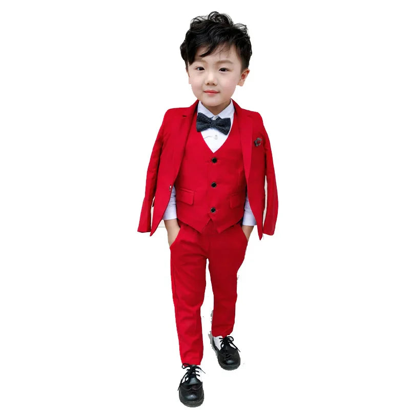 Boy wearing white cotton blazer, vest, and pants from LUOBOBEIBEI 4-piece formal wedding suit by SHOWLU FASHION STORE.