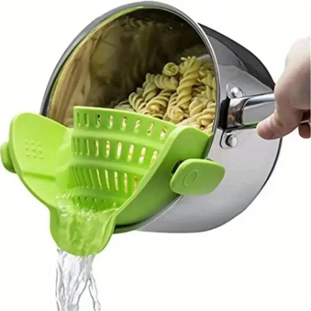 Showlu Smart General clip-on pot strainer attached to a saucepan, featuring a stainless steel mesh for easy straining.