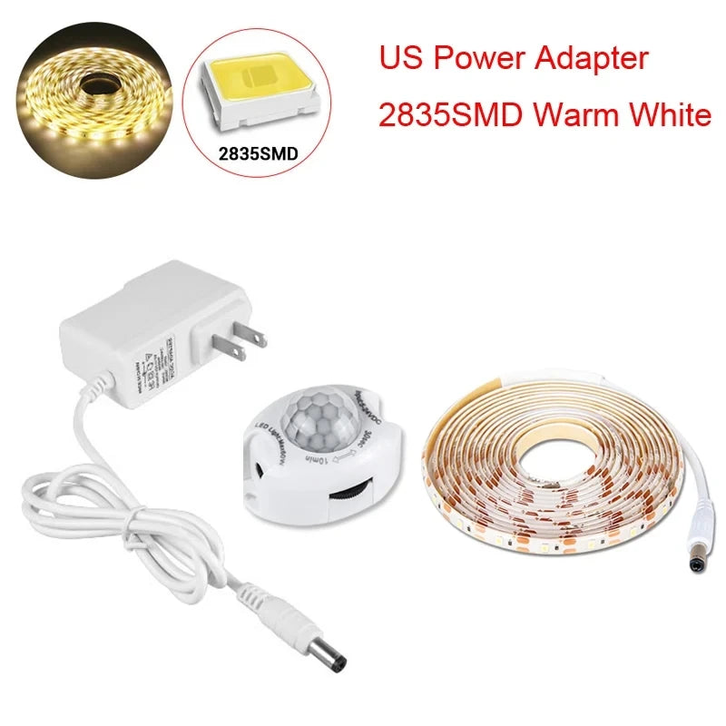Showlu Smart General LED under bed motion sensor light illuminating a bedroom floor with soft, energy-efficient lighting.