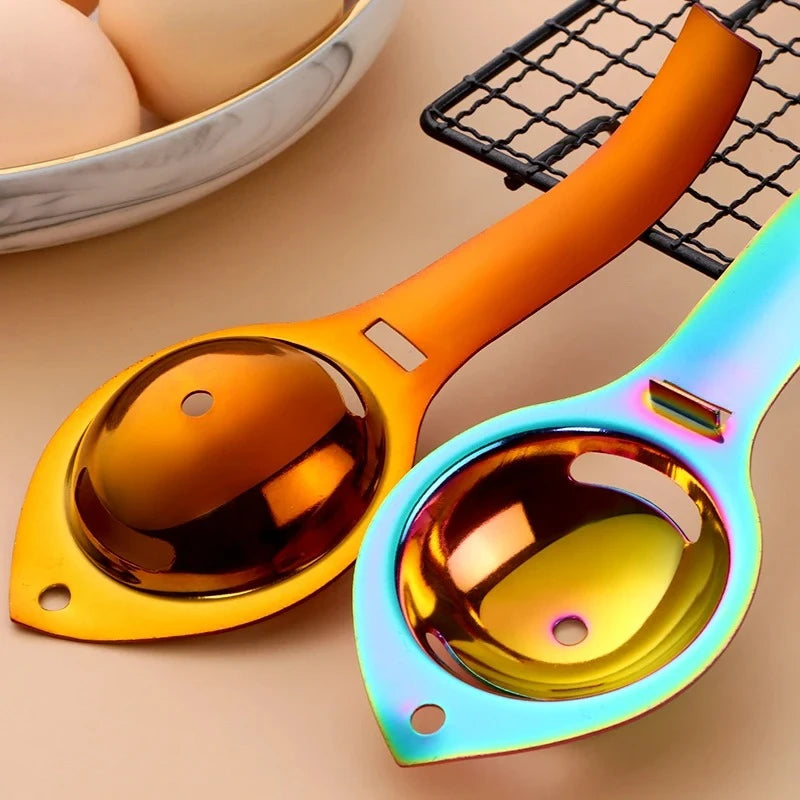 Stainless steel egg separator with handle, showing egg yolk and white separation for baking and cooking in a kitchen.