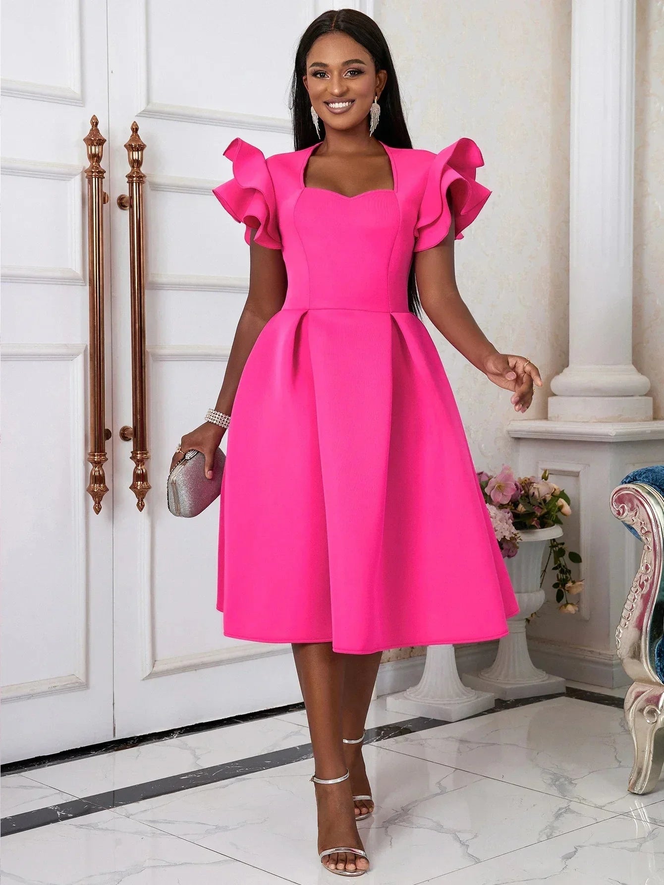 AOMEI women's sweetheart neck fit and flare pleated skater dress in black, shown on a model with a fitted waist and flared skirt.