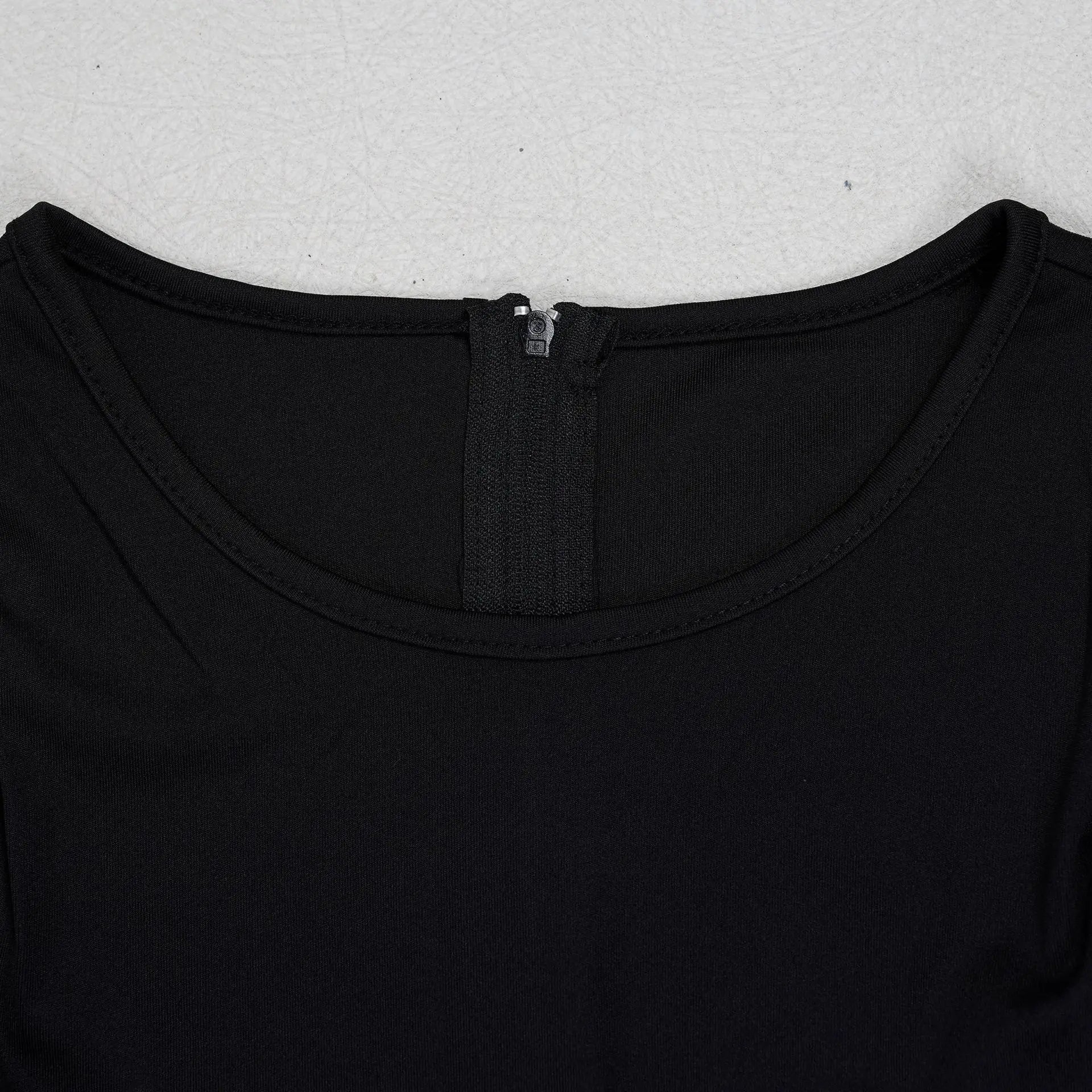 Elegant women's round-neck pleated dress with button details, irregular slit hem, ideal for commuting, by Showlu Fashion.