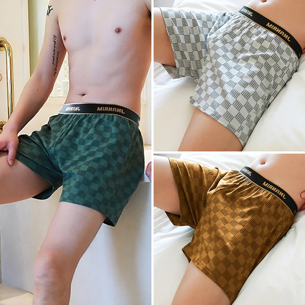 Showlu men's cotton plaid boxer shorts in a 3-pack, featuring loose, breathable underwear with a classic plaid design.