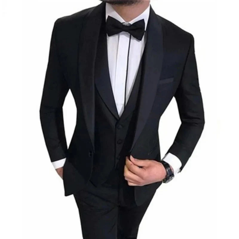 Black men's slim fit tuxedo suit with shawl lapel, three-piece wedding set, featuring jacket, vest, and trousers by SHOWLU FASHION STORE.