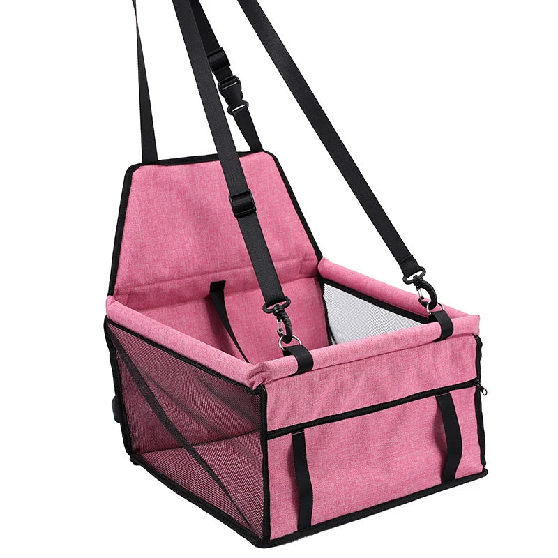 Showlu Fashion breathable nylon dog car seat cover in a folding pet hammock design, protecting car seats from pet hair and dirt.