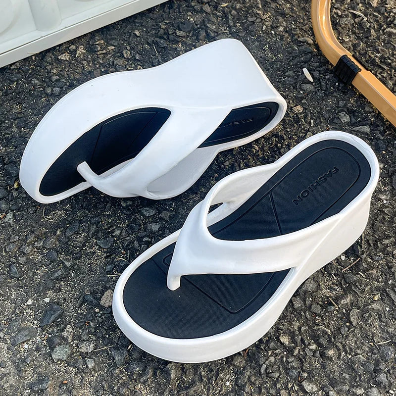 SHOWLU Women's platform wedge flip flops with thick EVA sole, summer sandals featuring a casual open-toe design and adjustable straps.