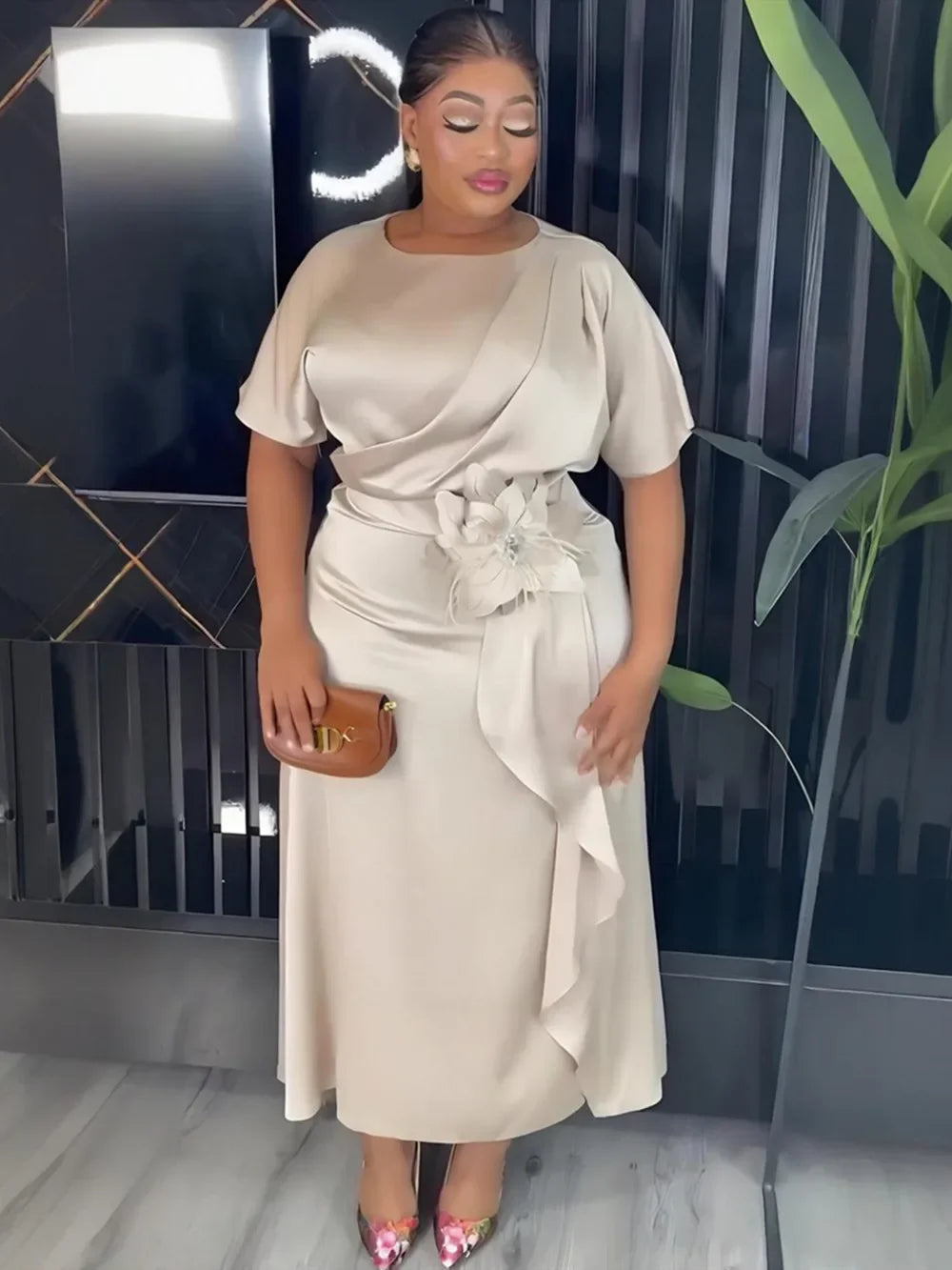 Elegant plus size African dashiki Ankara gown featuring vibrant patterns and flowing fabric, perfect for stylish occasions.