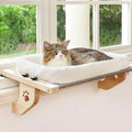 Showlu Cat Window Perch made of sturdy wood with a cushioned hammock bed for comfortable feline lounging near a window.