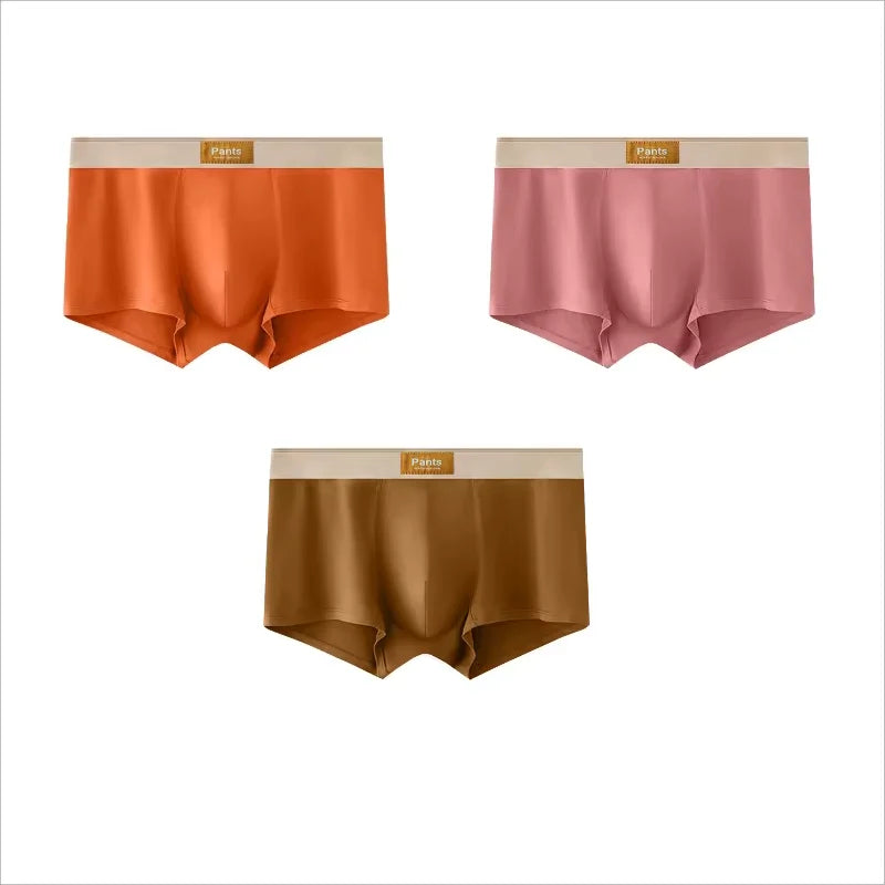 Four pairs of Showlu Fashion men's cotton boxer briefs in large sizes, breathable, comfortable, and suitable for sports.