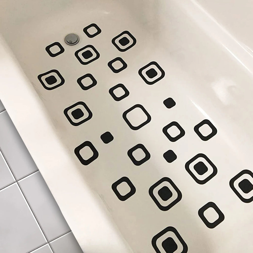 Showlu Smart General anti-slip bath stickers on a bathtub surface, providing safety and traction in wet conditions.