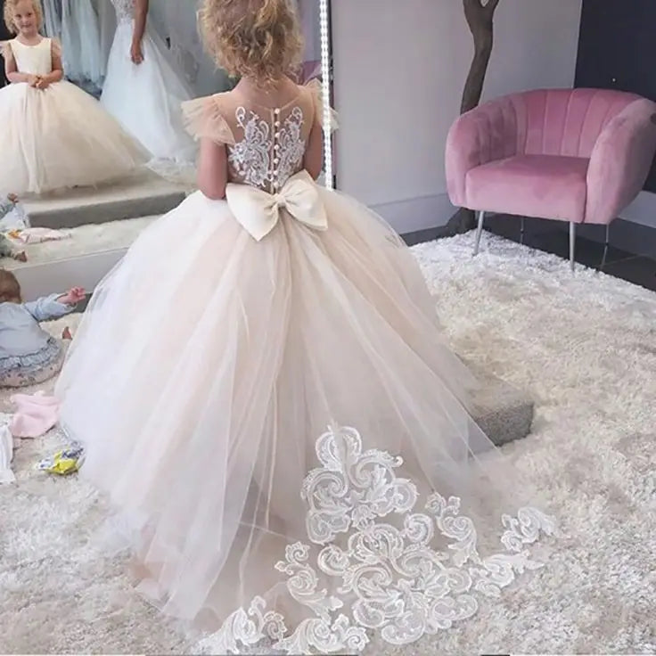 Pink lace flower girl dress with floral tulle ball gown design by Showlu Fashion Store, featuring delicate lace and a full, flowing skirt.