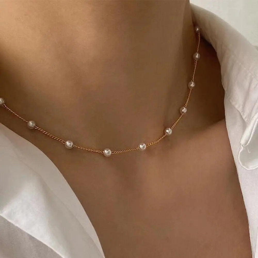 Pearl choker necklace by Showlu Fashion with double-layer chain and pendant, stylish jewelry for women.