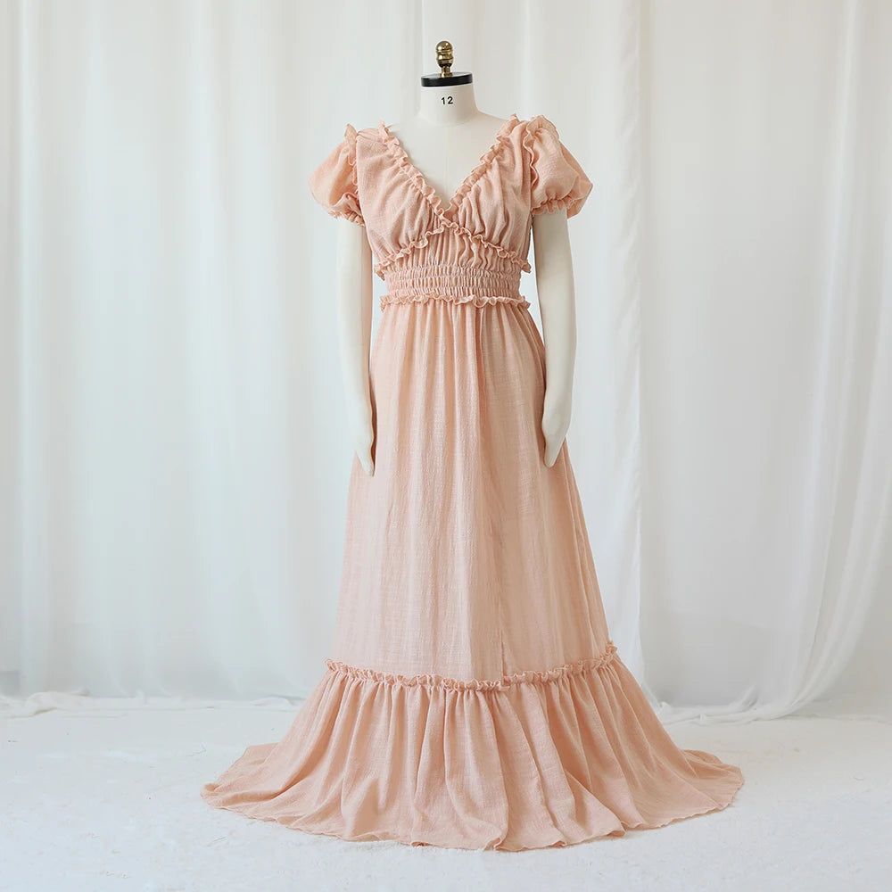 Showlu Bohemian maternity maxi gown with off-shoulder ruffled design, perfect for photos and special occasions.