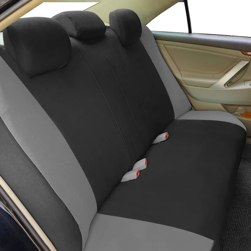 Set of four polyester football pattern car seat covers by AUTO PLUS, featuring vibrant football designs for universal fit.