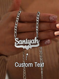 Showlu Custom Double Name Necklace with stainless steel Figaro chain, featuring two personalized name pendants on a stylish chain.