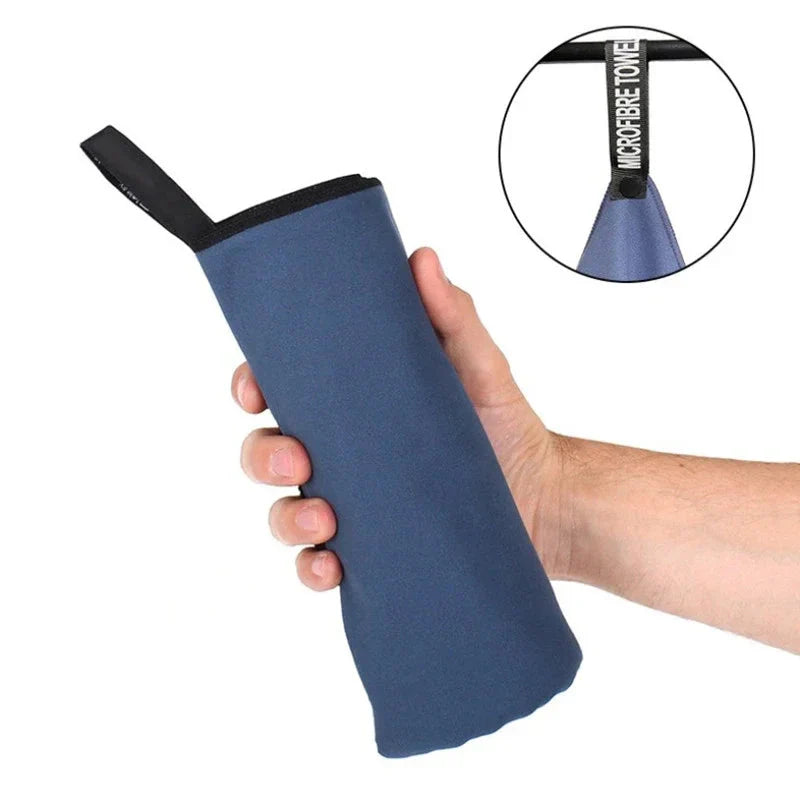SHOWLU quick-drying microfiber sports towel for gym, swimming, and beach, shown folded with soft, lightweight fabric.