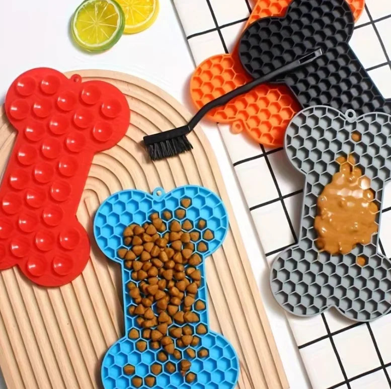 Dog slow food pad bone-shaped silicone licking mat for pets, ideal for dogs and cats, from Showlu Fashion Store.