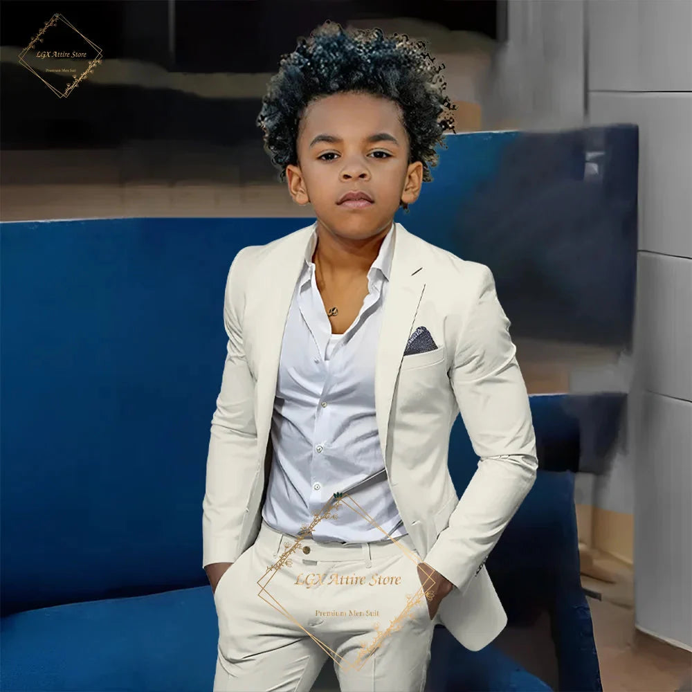 Orange slim fit boys' 2-piece suit with single-breasted twill jacket and matching trousers, stylish and well-fitted for boys.