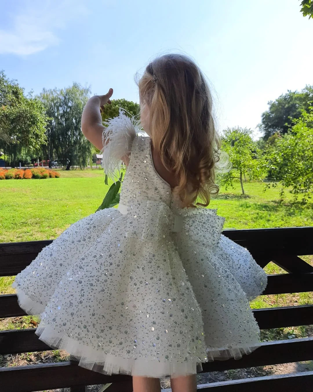 Lace flower girl dress by Showlu Fashion featuring floral tulle ball gown design for weddings, with delicate lace details and a full skirt.