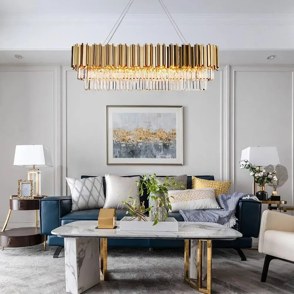 Luxury gold crystal chandelier lighting fixture with oval pendant design, ideal for dining rooms and kitchen islands.