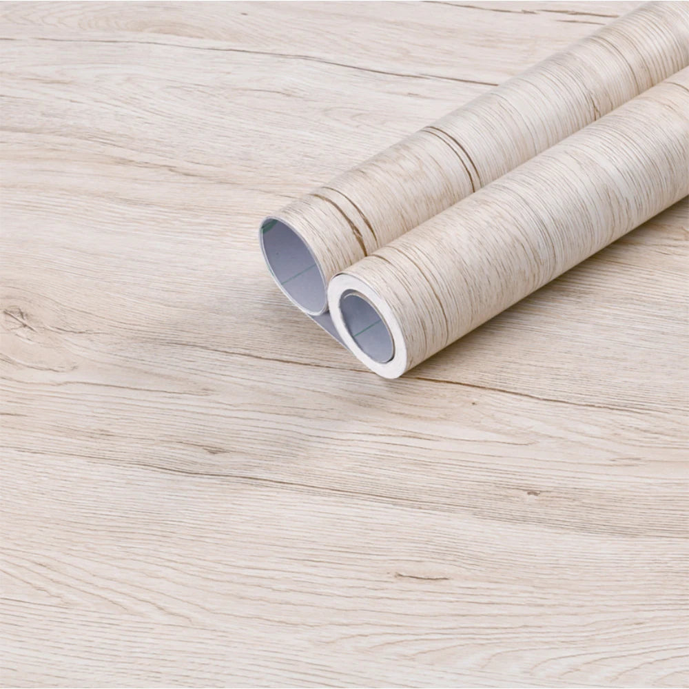 PVC waterproof self-adhesive wallpaper roll with wood grain design for home decor, furniture, and cabinet renovation.