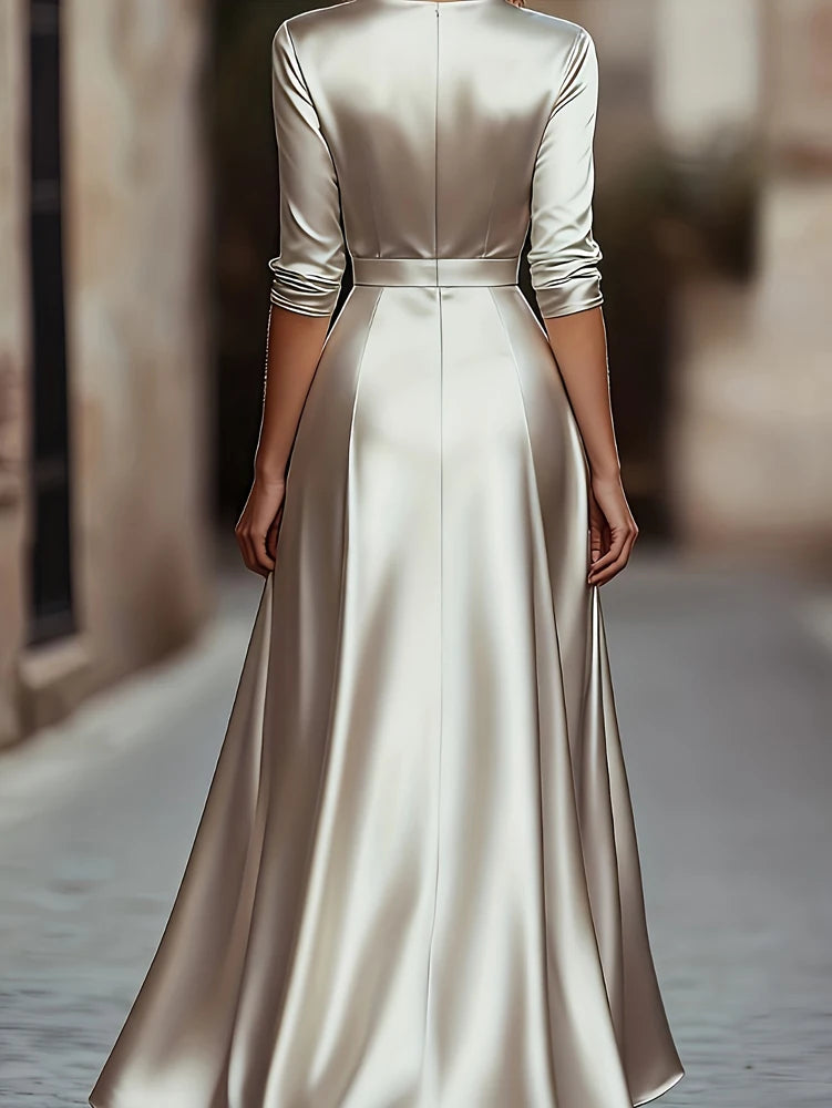 Showlu V-Neck long-sleeved evening gown featuring a French A-line floor-length design with elegant fabric and flowing silhouette.