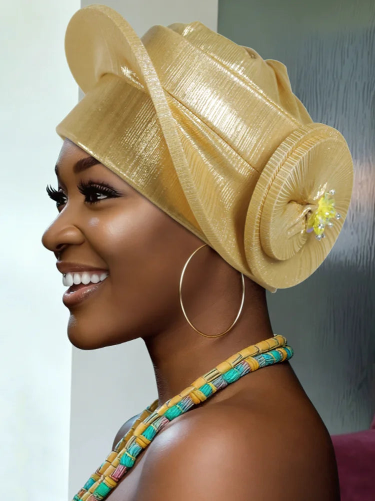 Nigerian headtie styled with 2026 Auto Gele by Showlu Smart General, featuring intricate folds and vibrant fabric for special occasions.