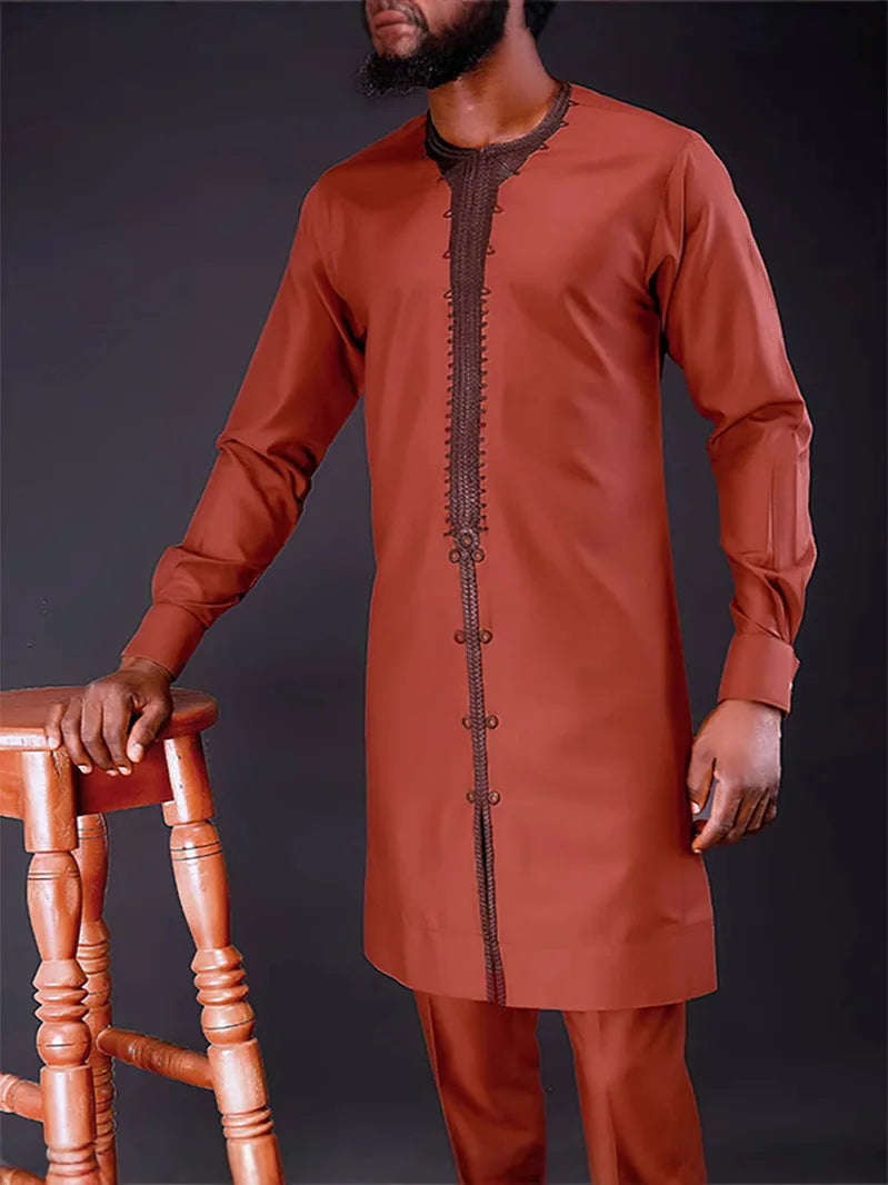 Whatwill men's 2-piece African Kaftan set featuring traditional dashiki design, in vibrant fabric with intricate patterns.