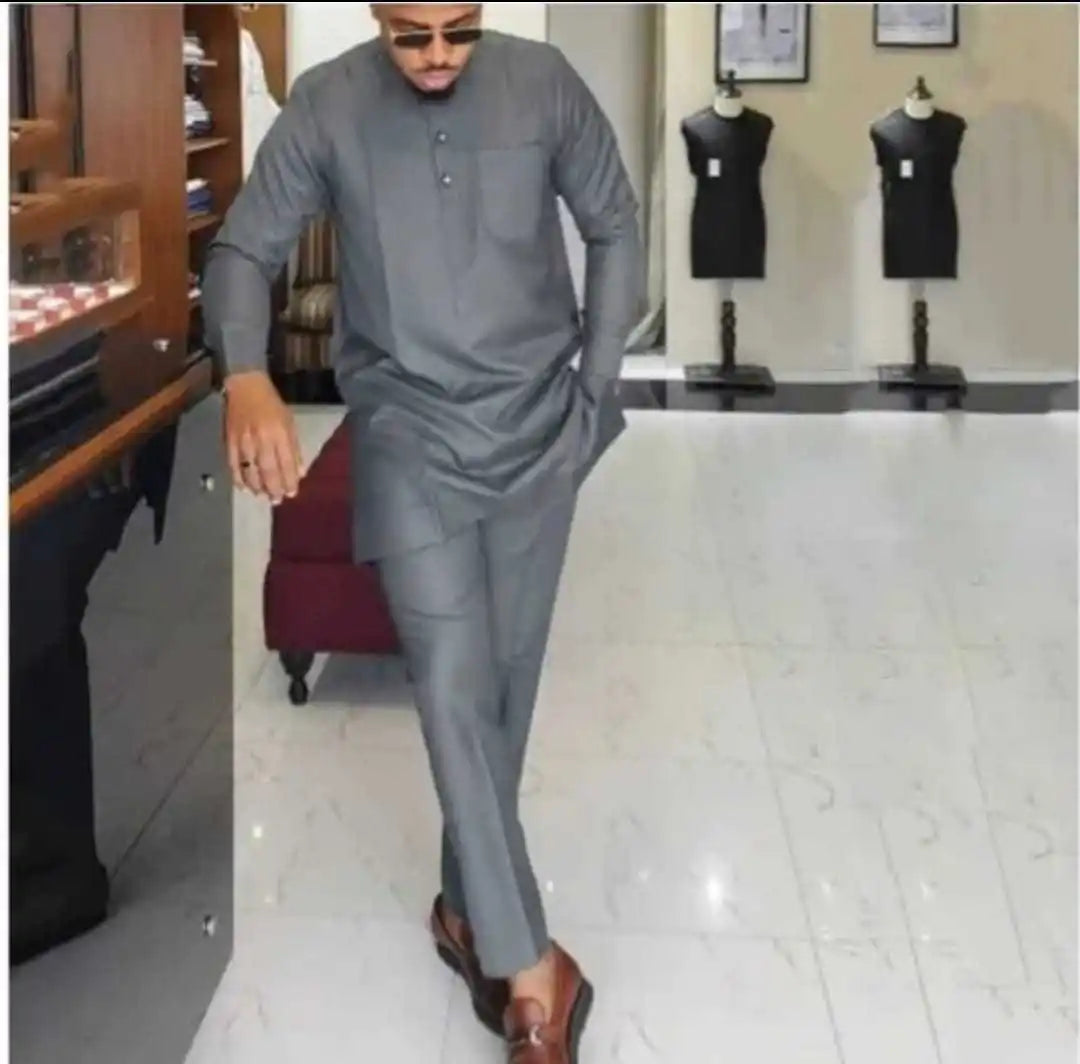 African ethnic men's 2-piece long sleeve patchwork outfit by SHOWLU FASHION STORE, featuring vibrant traditional fabric and design.