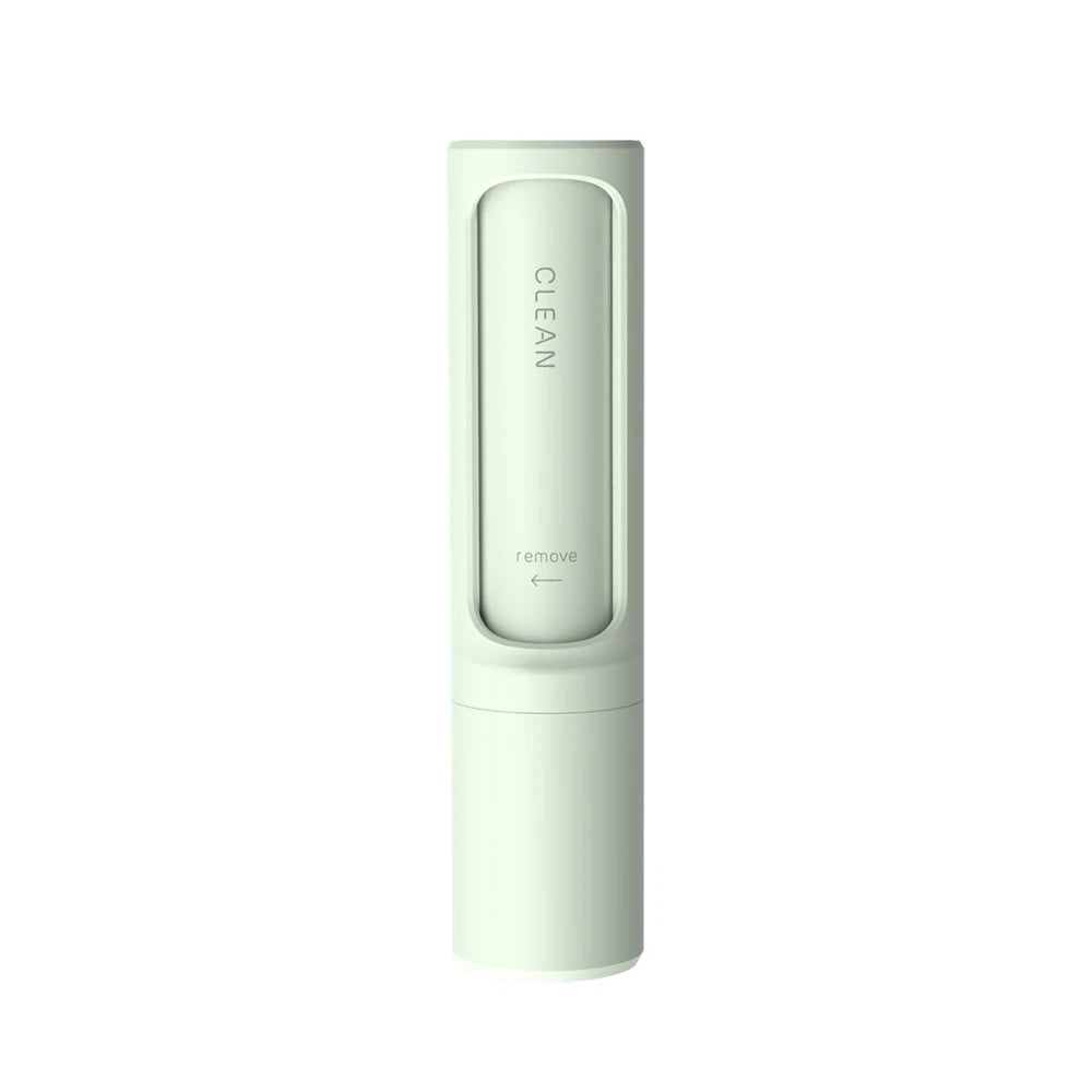 Showlu Smart General reusable pet hair remover roller with manual lint cleaning brush on a white background.