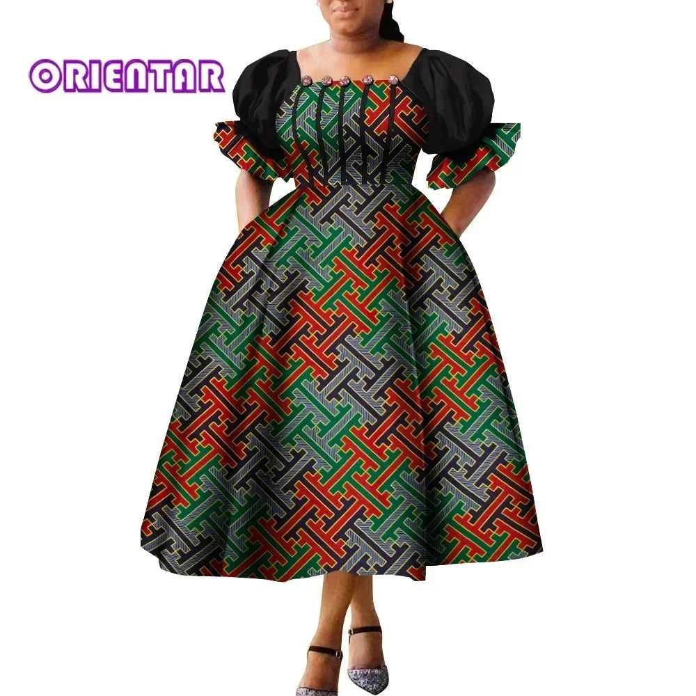 African print puff sleeve high waist Ankara cotton gown by SHOWLU FASHION STORE, featuring vibrant patterns and elegant design.