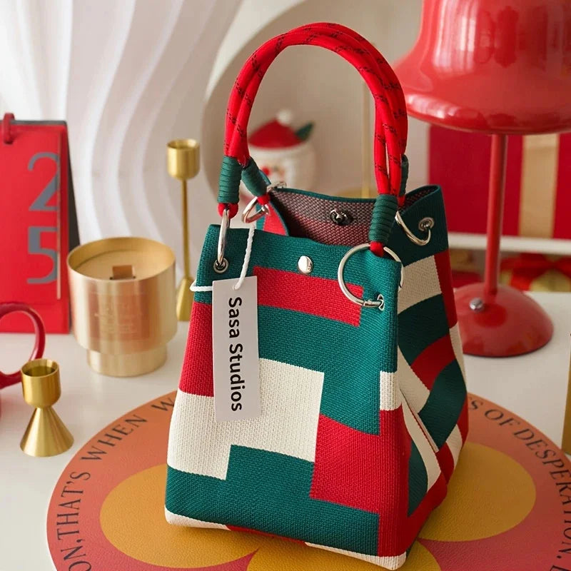 Vintage floral knit tote bag for women with adjustable straps, metal rings, snap closure, lightweight design, perfect for casual travel.