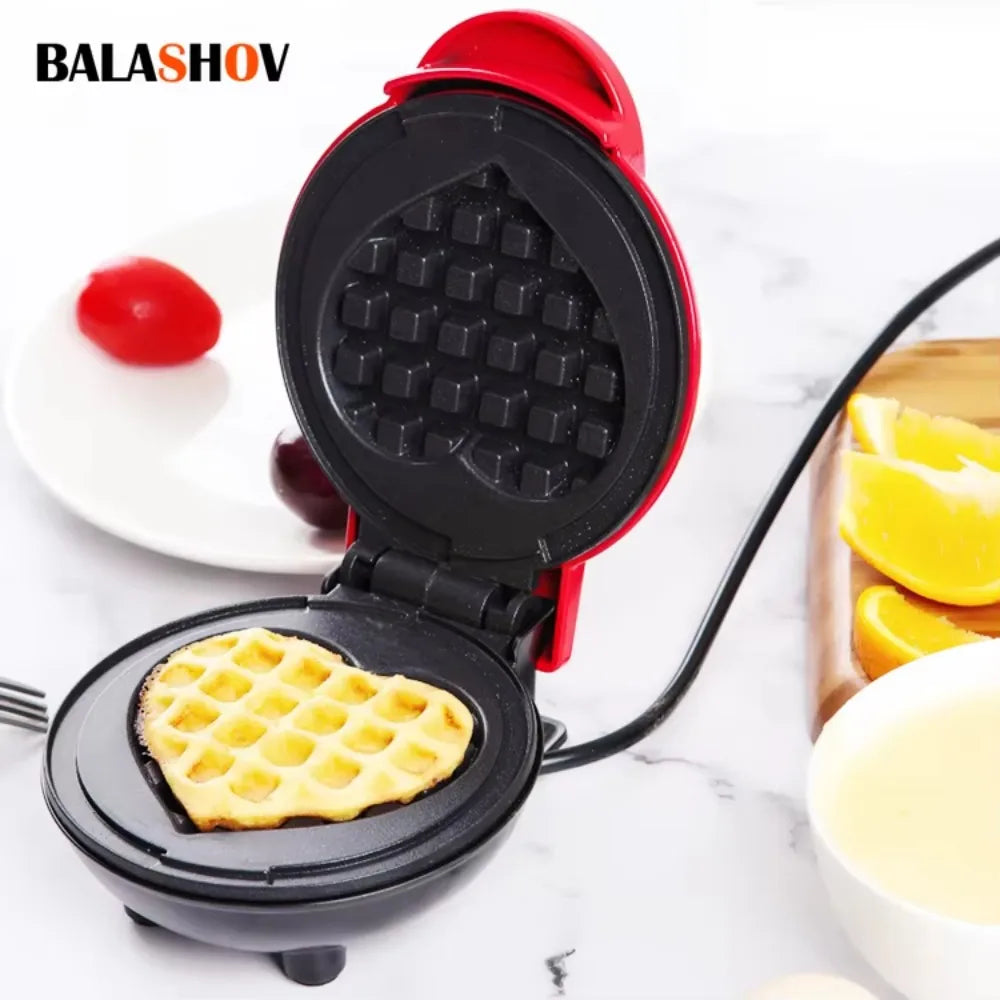Showlu Smart General mini electric waffle maker with non-stick surface and compact design, 350W for quick waffle baking.