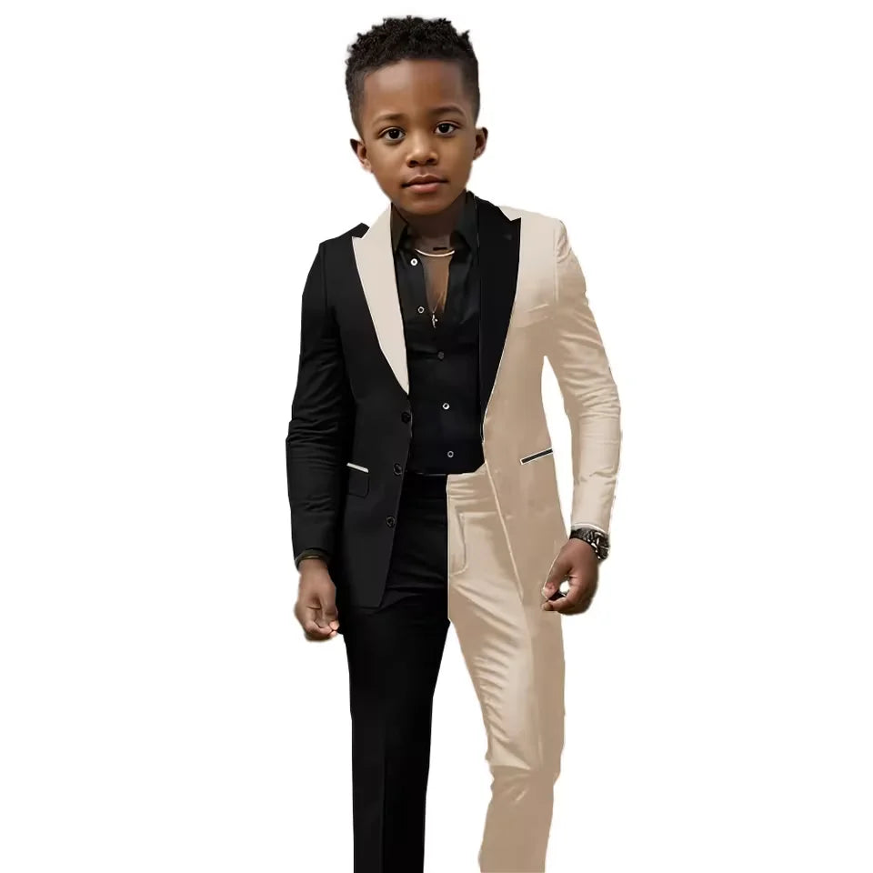 Black and white spliced boys wedding suit with jacket and pants, slim fit tuxedo for ages 2T-16T, perfect for special occasions.