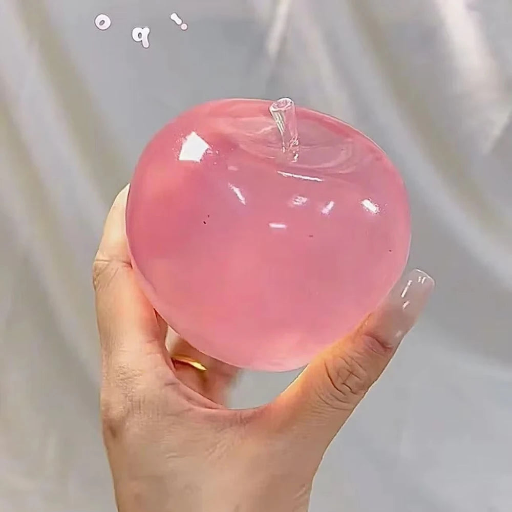 Transparent squishy Maltose stress ball from Showlu Fashion Store, slow-rise sensory ball for stress relief and hand exercise.