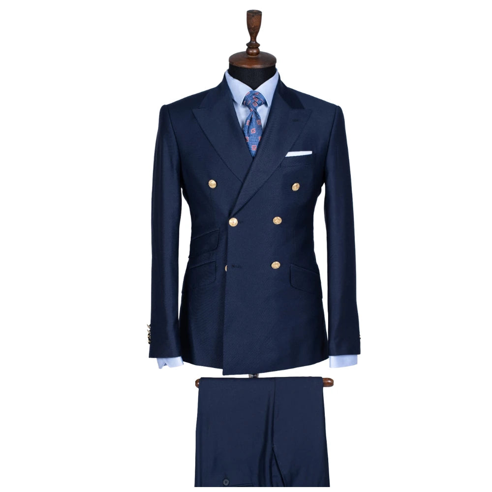 Slim fit double-breasted men's tuxedo suit with peak lapels, jacket and pants, ideal for weddings and formal events.