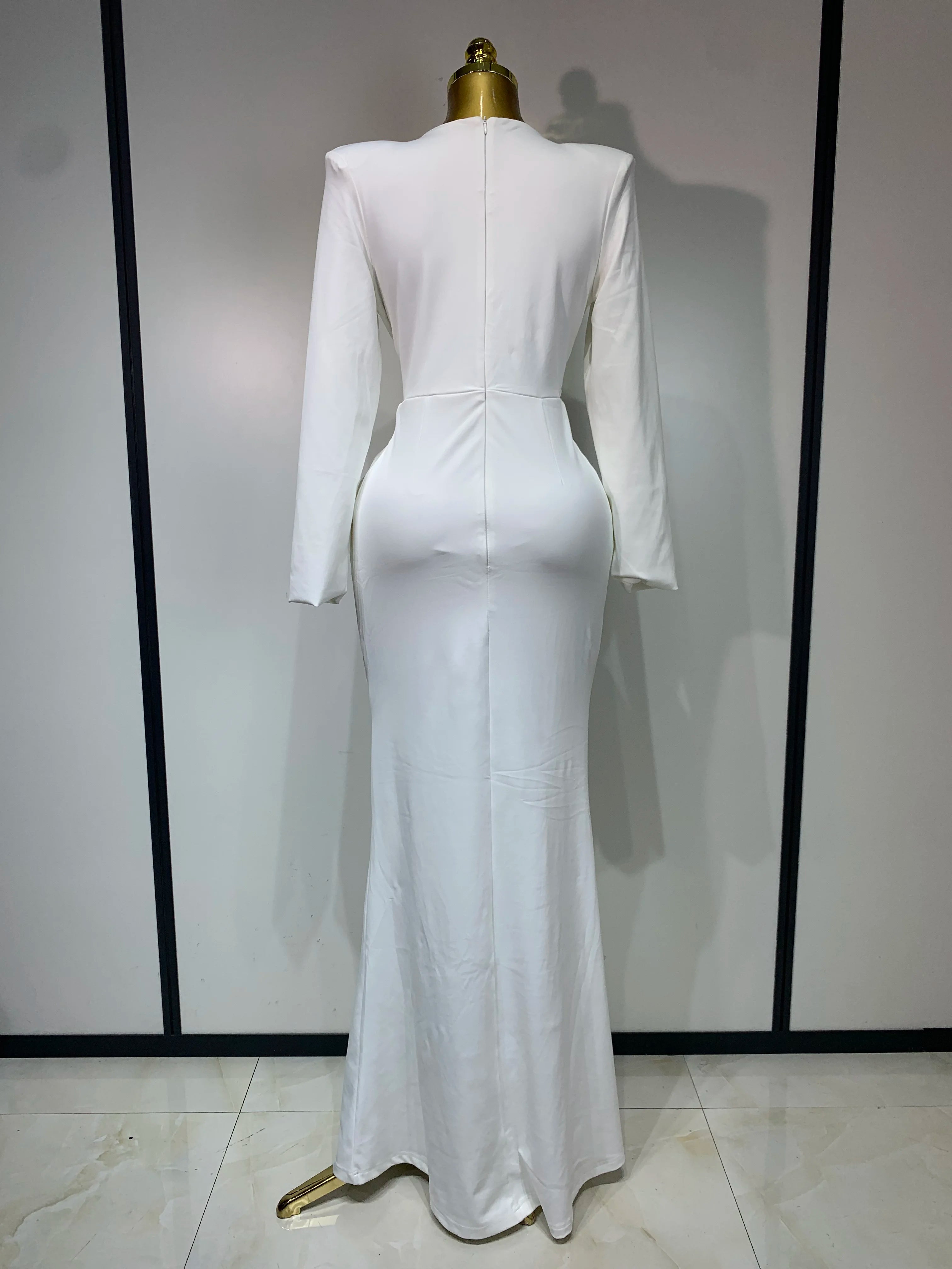 Women’s long sleeve deep V-neck bodycon evening dress by Showlu Fashion, perfect for parties, cocktails, and celebrations.
