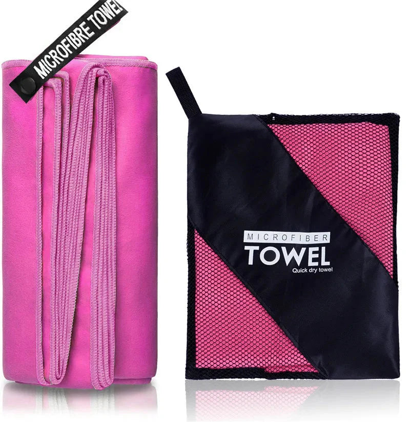 SHOWLU quick-drying microfiber sports towel for gym, swimming, and beach activities, shown folded and ready for use