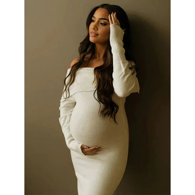 Showlu white off-shoulder knit maternity dress for pregnancy photoshoot, featuring a soft, stretchy fabric and elegant fit.