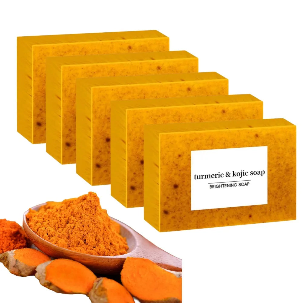 Handmade turmeric soap with lemon and kojic acid, ideal for shower and facial cleansing, shown in a natural soap bar.