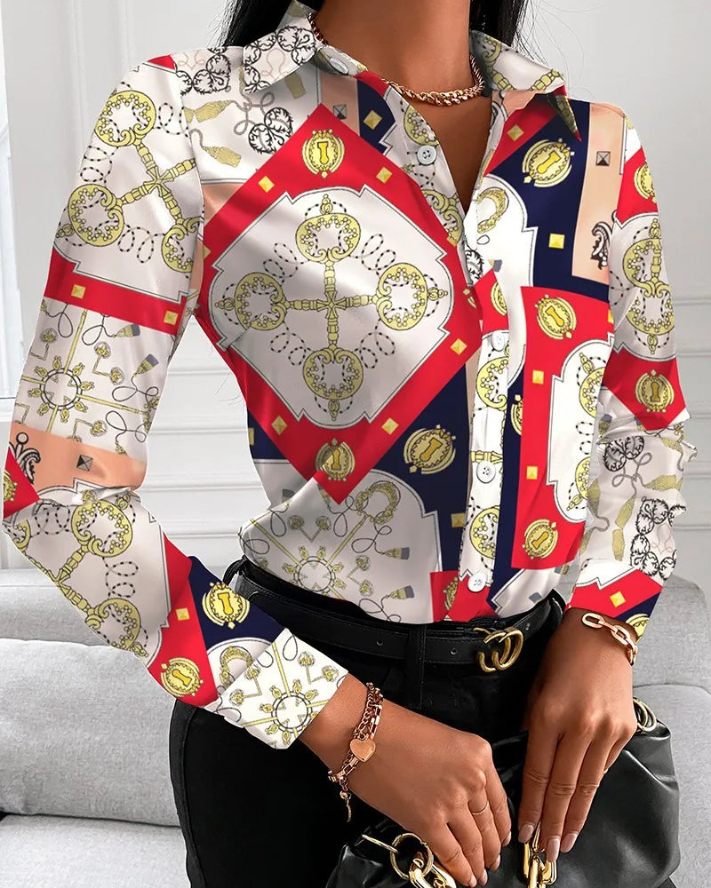 Women’s long sleeve blouse by Showlu Fashion featuring floral, chain, letter, and geometric square print with turn-down collar.