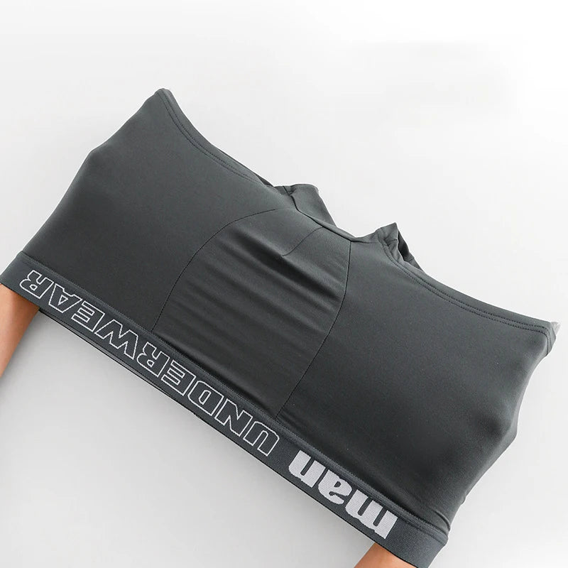 Four pairs of men's cotton boxer briefs in black, size L to 4XL, breathable and comfortable, suitable for fitness and sports.