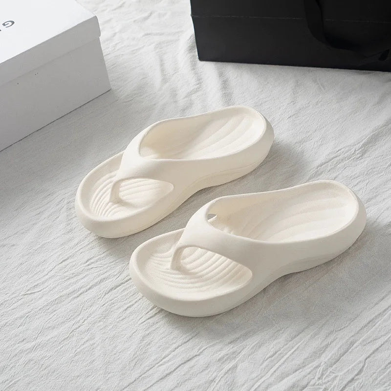 Women’s stylish EVA flip-flops by Showlu Fashion Store featuring soft, anti-slip, anti-odor soles, perfect for beach and summer casual wear.