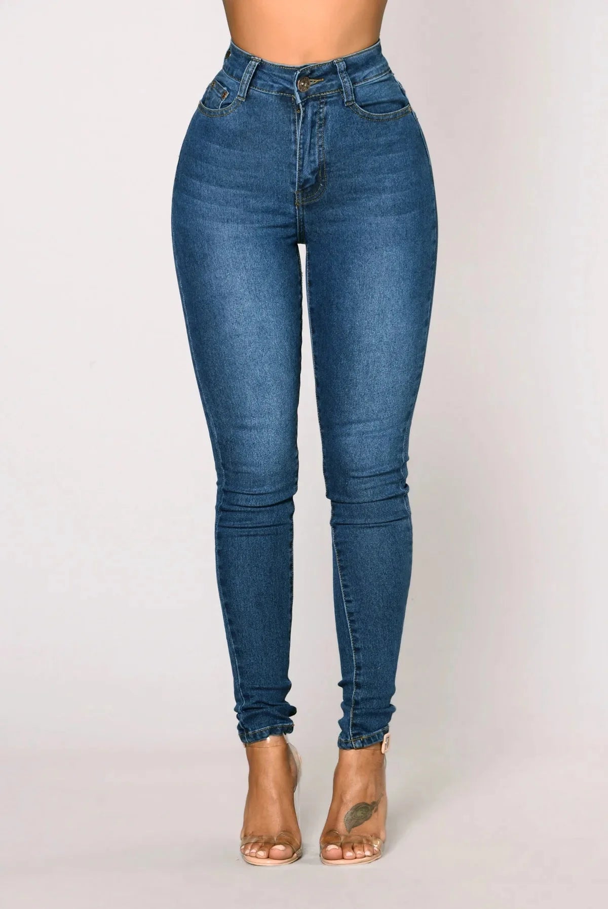 High waist skinny denim jeans for women featuring ankle-length, pencil fit from SHOWLU FASHION STORE, shown in black denim.