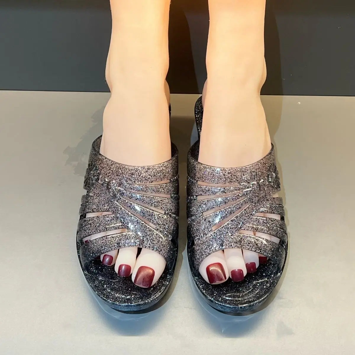 Lorilury women's transparent jelly slippers with glitter wedge heel mules, showcasing clear straps and stylish design.