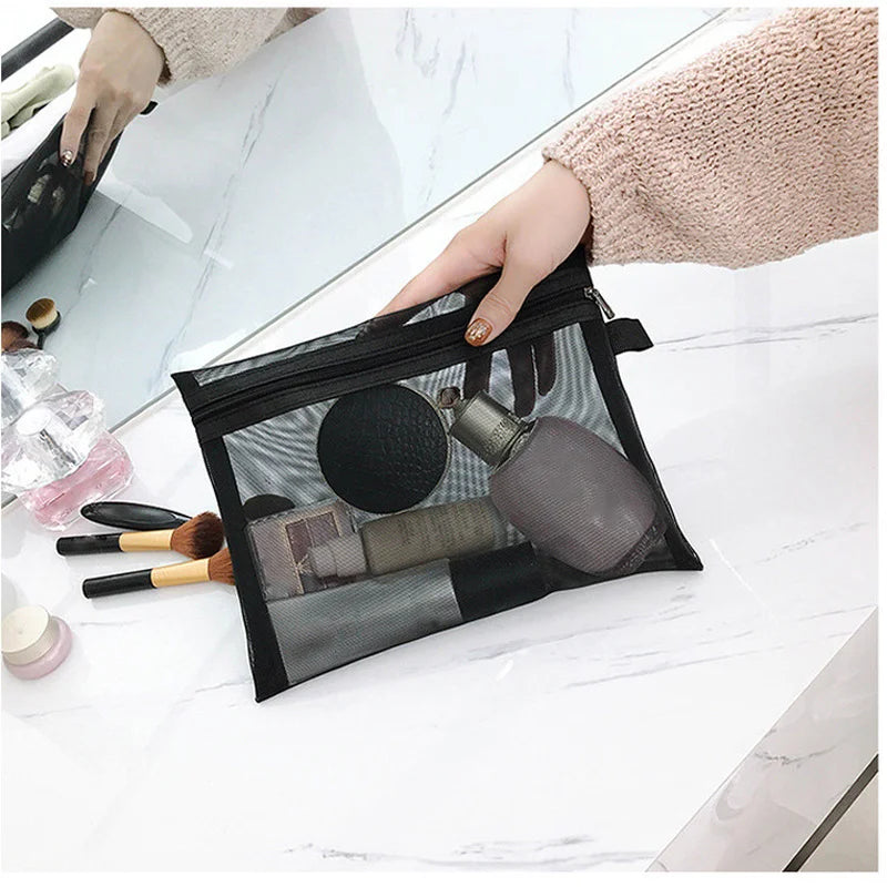 Black transparent mesh makeup bag by Showlu Fashion Store, small and large cosmetic organizer for storing beauty products and pencils.