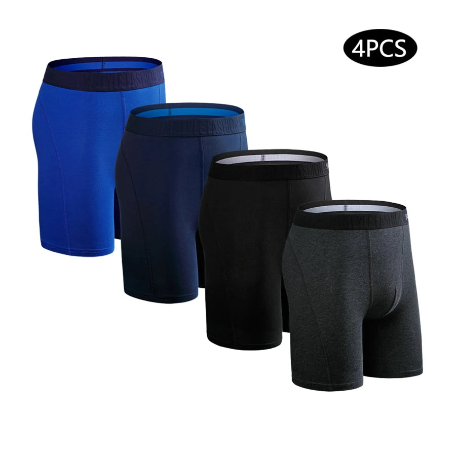 Set of four men's long leg boxer shorts by SRBONITOS, cotton trunks in plus size with comfortable fit, shown in black and navy.