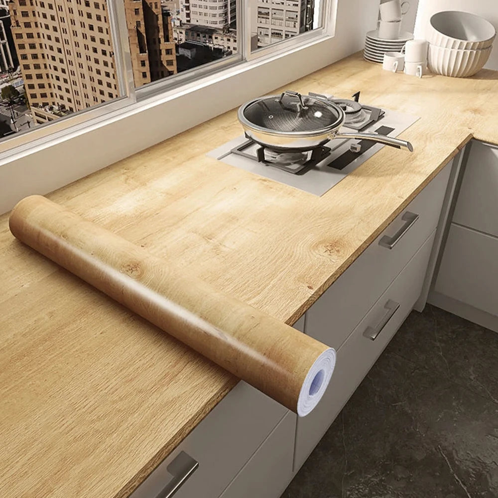 PVC waterproof self-adhesive wallpaper with wood grain design, ideal for furniture, walls, and cabinet decor.